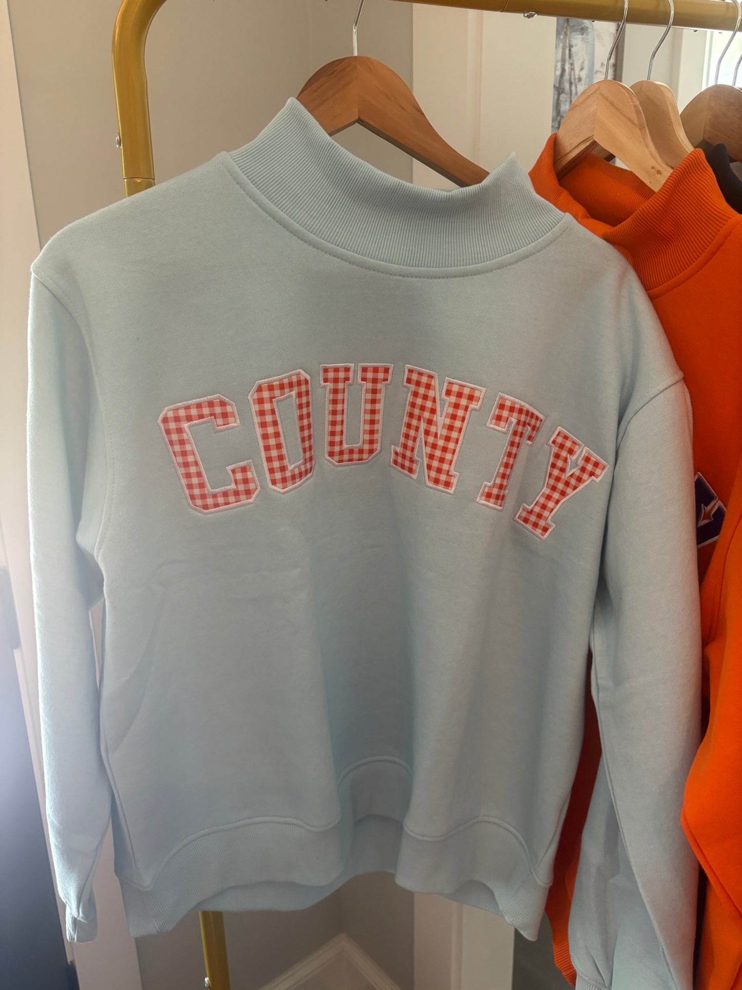 In Stock Light Blue COUNTY mockneck
